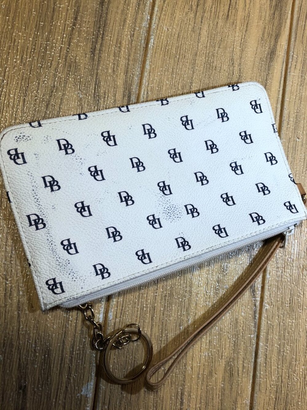 Dooney & Burke women white beige wristlet, one top zip